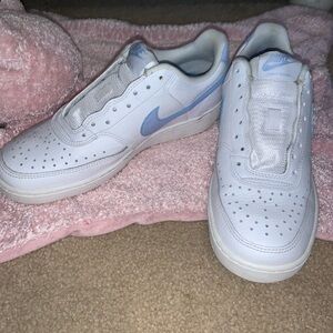 Nike Women's White Sneakers with Light Blue Swoosh